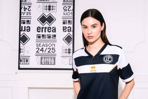 A model wearing the FC Lugano 2024/25 home shirt by Erreà.