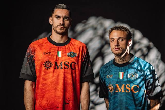 SSC Napoli players Alex Meret and Amir Rrahmani presenting the orange and teal Halloween special shirts for the 2025-2026 season.