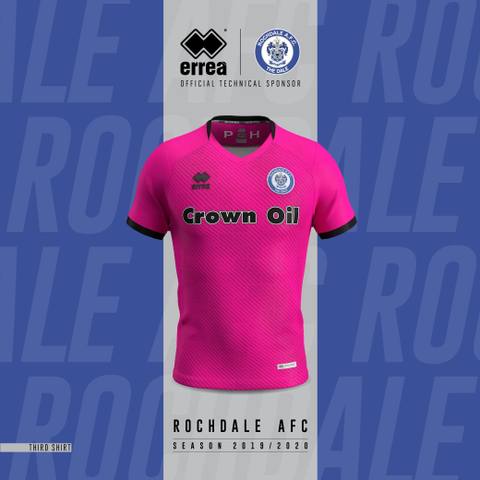 The Rochdale A.F.C. 2019/20 third shirt features a bright pink design with diagonal lines and black trim, produced by Erreà.