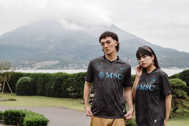 Two models present the SSC Napoli 2024/25 third shirt during a campaign shoot in Japan