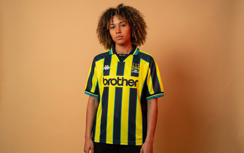 AI recreation of the Manchester City away 1999 shirt, generated by Kitlist from its documented design record.
