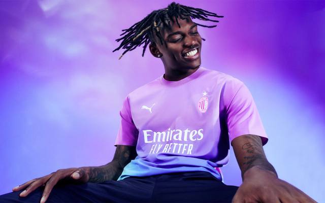 Rafael Leão modeling the AC Milan 2023/24 third shirt
