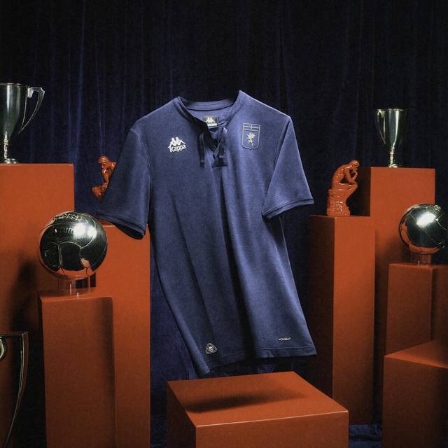 The Genoa CFC third shirt featured on a stylized set with trophies and pedestals.
