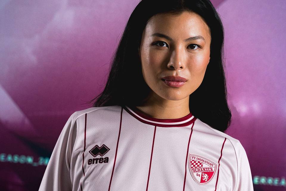 A model wearing the FC Ingolstadt 04 third shirt manufactured by Erreà.