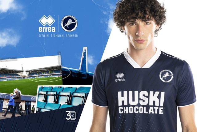 Promotional graphic featuring a model wearing the Millwall FC 2023/24 home shirt alongside images of The Den stadium.